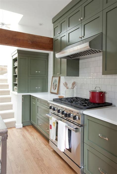 The cabinets are painted with play grey green which offers the entire kitchen a traditional touch. Alice and LoisHome Crush - Painted Kitchen Cabinets ...