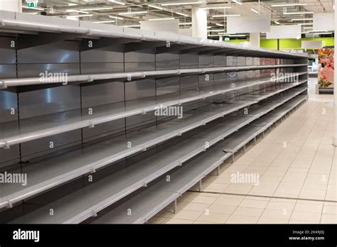 Empty shelves in store, supermarket, shopping mall Stock Photo - Alamy