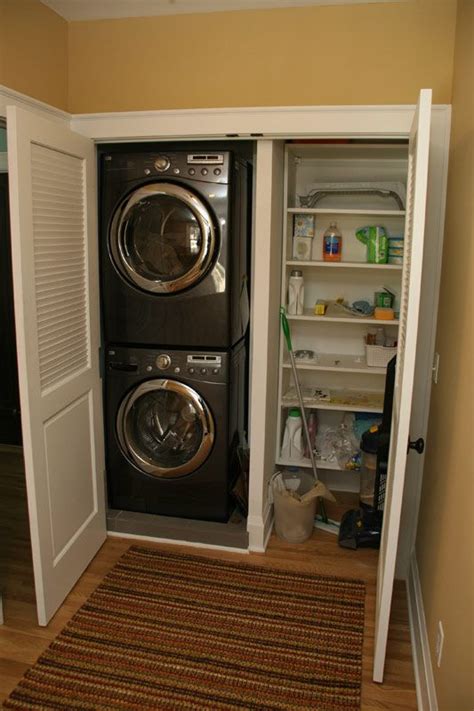Stacked washer and dryer set in the bathroom off the kitchen. Laundry Closet: stacking front loaders to make the most of ...