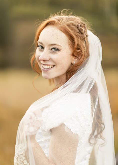 Beautiful Bride Holding Veil Bride Headshot Red Hair Inspiration White