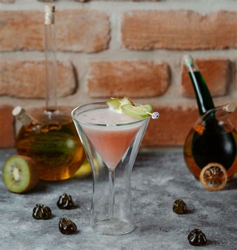 Free Photo Pink Alcohol Vanilla Cocktail In A Cosmopolitan Martini Glass