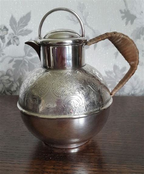 Large Silver Plated Teapot With Wicker Handle And Finial Catawiki