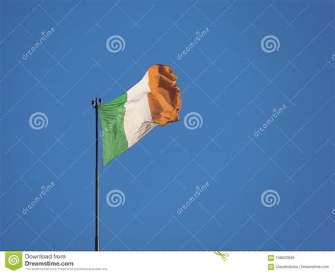 Irish Flag Of Ireland Over Blue Sky Stock Photo Image Of Flags