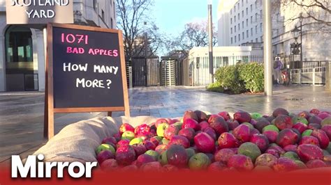 Protestors Place 1000 Rotten Apples Outside Met Police Office Youtube