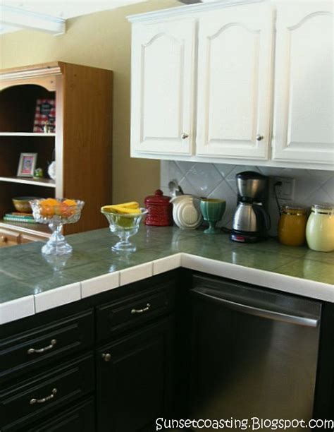 Cream cabinets, black distressed cabinets, weathered cabinets. Sunset Coast: My Black and White Painted Kitchen Cabinets