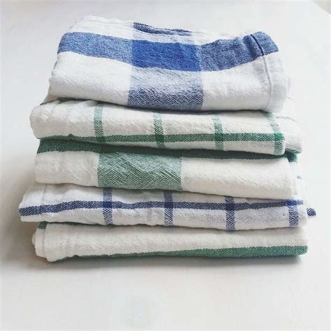 Should You Wash Dish Towels With Your Regular Laundry Southern Living