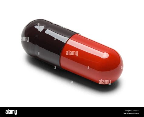 One Red And Black Pill Capsule Isolate On White Background Stock Photo