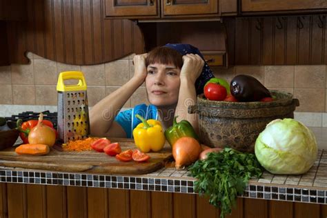 Tired Woman In Kitchen Among Vegetables Stock Image Image Of Meal Colorful 84273011