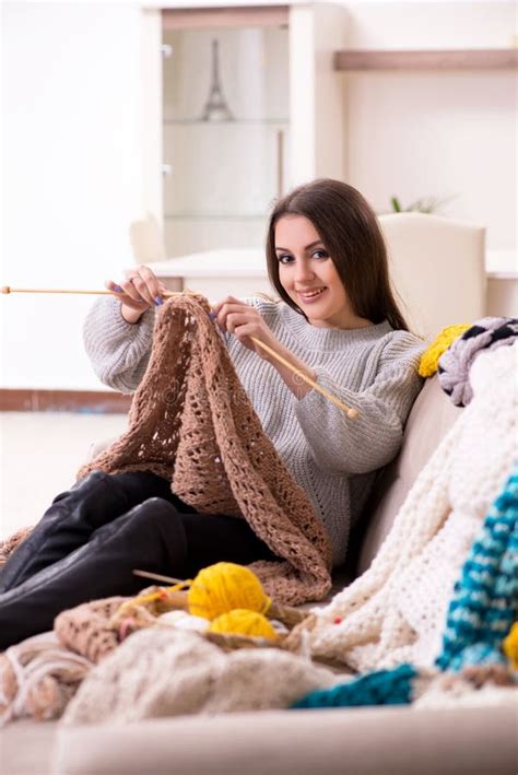 The Young Beautiful Woman Knitting At Home Stock Photo Image Of Ball