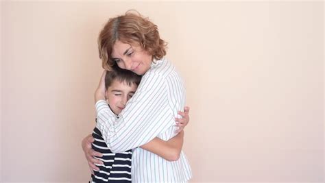 Mother and Son Hugging Stock Footage Video (100% Royalty-free) 21521200 