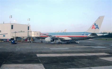 He speaks it i don't. AA @ SJU, San Juan International Airport, Puerto Rico | Flickr