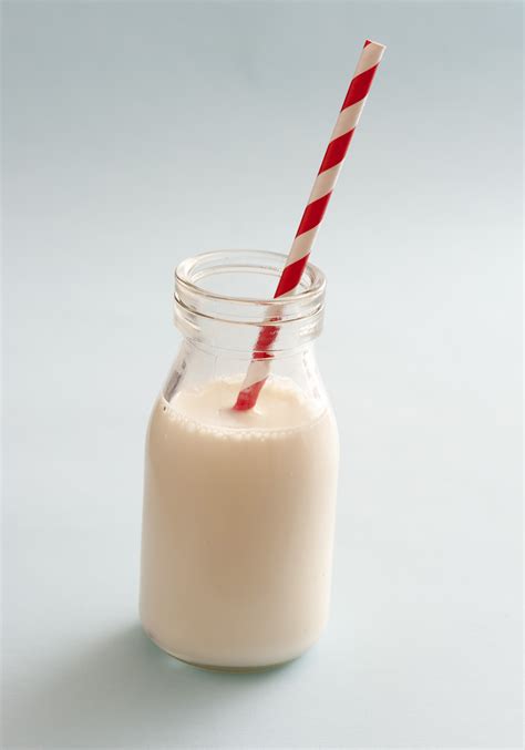 Free Stock Photo 13003 Small Glass Bottle Full Of Milk With A Straw