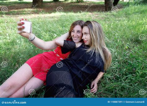Girls Smile And Take A Selfie Together Stock Image Image Of Friends Girls 118887391