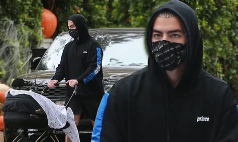 Joe Jonas Sports A Face Mask On Dad Duty As He Takes A Walk With