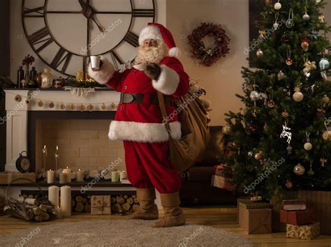 Santa Claus At Home Stock Photo By ©hasloo 92328246
