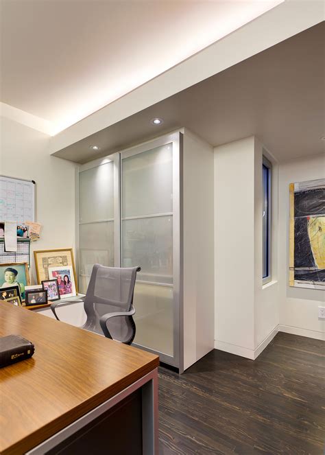 Using both modern recessed LED lighting, in tandem with recessed indirect (bounce) lighting, the ...