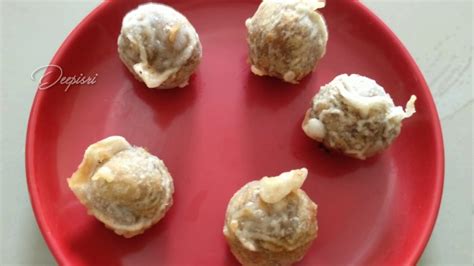 More like a deep fried dumpling with simple sweet stuffing. Sweet recipe|Suzhiyam Recipe|Crispy Susiyam recipe in ...