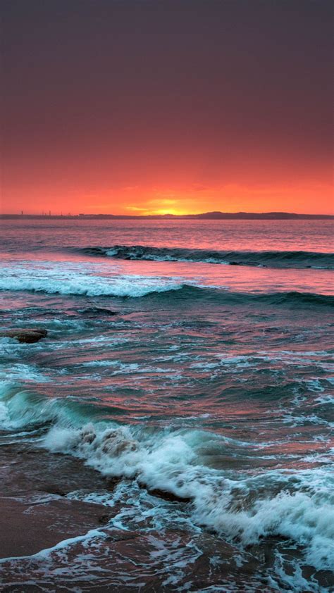 Download Wallpaper 1440x2560 Sea Horizon Sunset Waves Foam Surf Beach Qhd Samsung Galaxy
