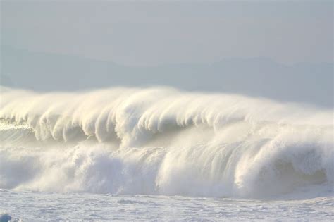 A Large Wave Is Coming In To Shore