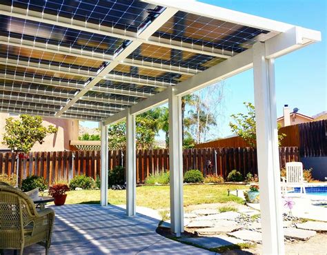 A Patio Covered In Solar Panels Next To A Swimming Pool