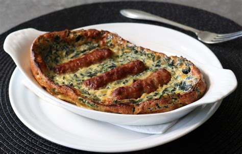 Tadpole In The Hole Breakfast Sausage And Kale Dutch Baby Recipe