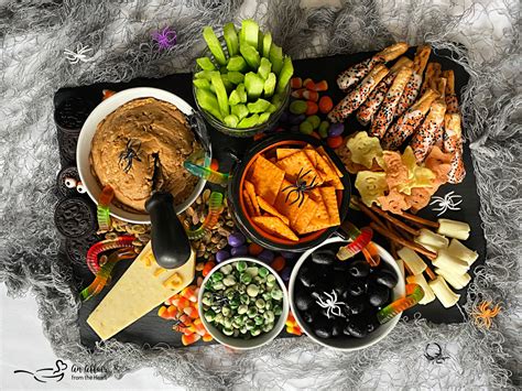 Sweet Savory Halloween Snack Board With Peanut Butter Dip