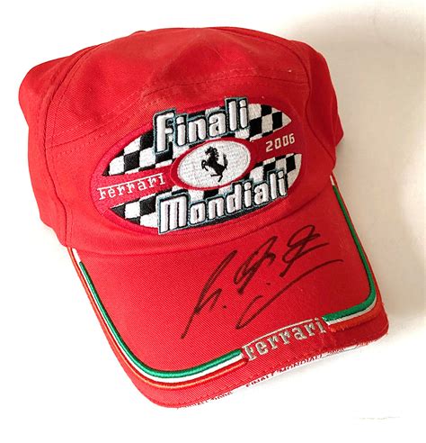 We have created motorsport memorabilia to provide a service right across the memorabilia and model. » Michael Schumacher signed Ferrari Mondiali cap