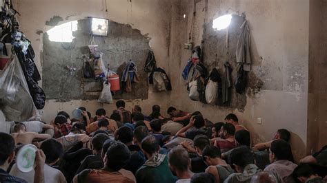 iraqis hold suspected isis militants in cramped stifling prison who say they want to die