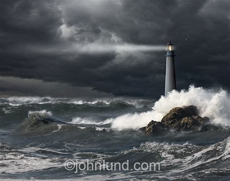Lighthouse In An Ocean Storm Stock Photo