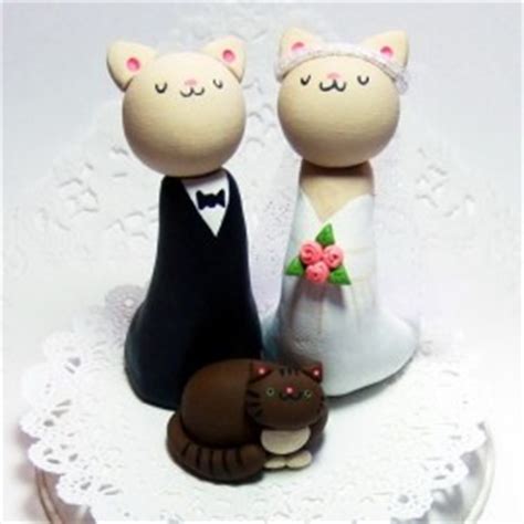 Confetti's cake toppers come in so many beautiful designs too, often boasting modern twists on traditional poses—dynamic poses with lovely features instead of the couple simply standing next to each other. How to find the funny cat wedding cake toppers in ten ...