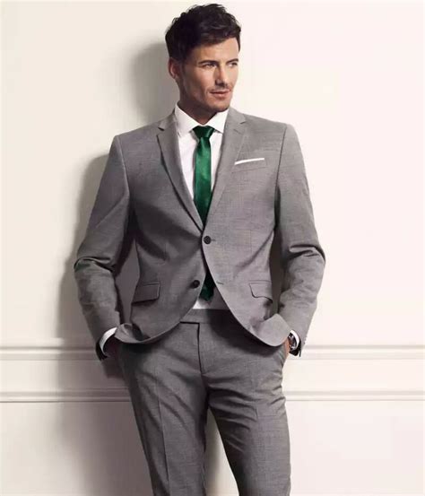 light charcoal suit with emerald green skinny tie wedding suits men wedding suits engagement