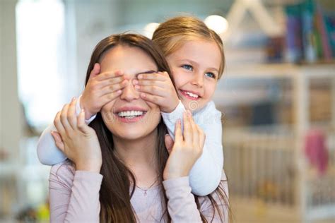 Happy Little Girl Cover Her Mother Eyes Stock Image Image Of Daughter