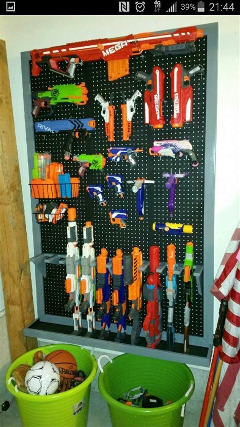 Diy nerf gun storage rack. Diy toy storage, Kids playroom, Boys playroom