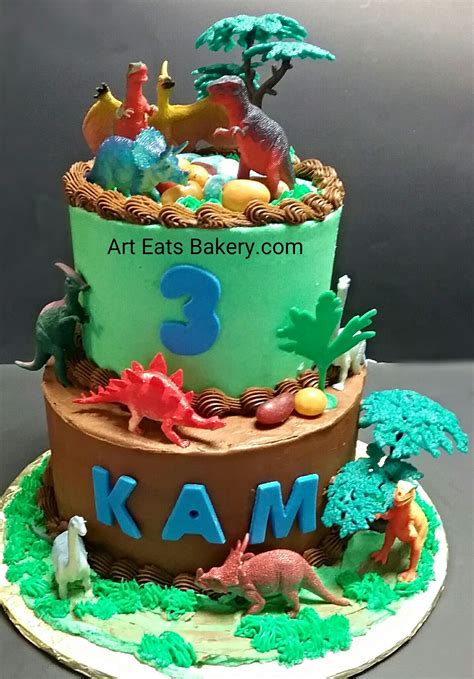 Two Tier Green And Brown Buttercream Cake With Edible Eggs And Grass