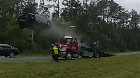 Watch Car Drives Up Tow Truck Ramp Launches Into The Air In South Georgia