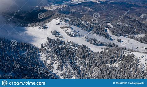 Aerial View Of Poiana Brasov Ski Resort From Postavaru Mountains In