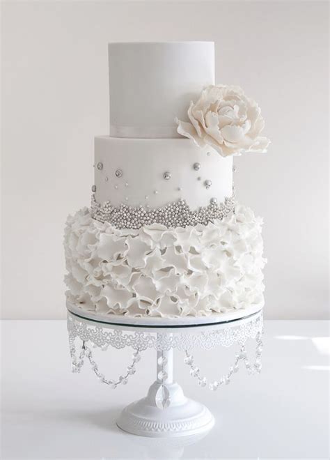 Elegant White Cake For Wedding With Sugar Silver Bow Deer Pearl Flowers