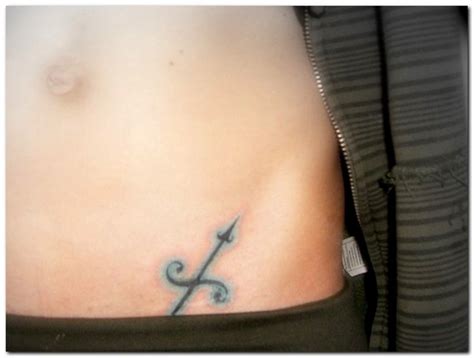 Sagittarius symbol of the zodiac tattoo on arm. Sagittarius Tattoos Pictures & Sagittarius Tattoo Ideas