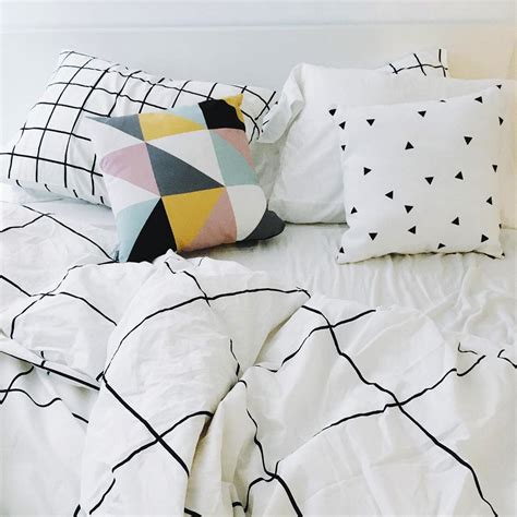 These minimalist bedrooms span a range of styles, from natural chic to industrial, including a variety of simple color schemes to help you get started. Modern minimalist bedding Grid Black Duvet Cover with ...
