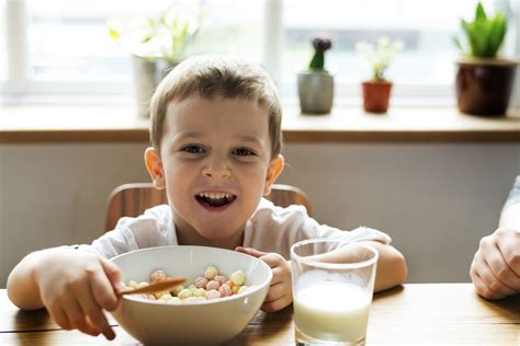 Little Boy Eating Breakfast Free Photo Rawpixel