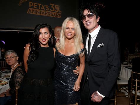 Pamela Anderson Puts On Busty Display In Sexy Gown As She Runs Into Ex Tommy Lee Celebrity