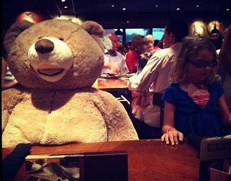 so my sister insisted on the biggest teddy bear ive ever seen joining us for dinner tonight at