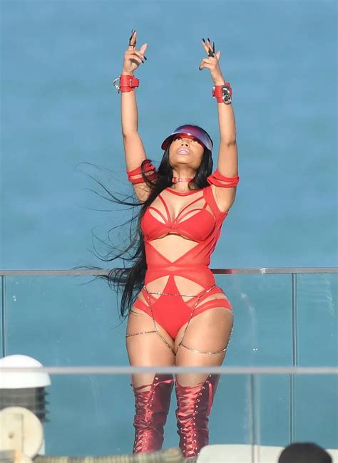 Nicki Minaj Shows Off Her Famous Curves In A Red Cutout Bodysuit Mirror Online