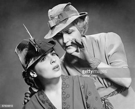 Whispering Vintage Photos And Premium High Res Pictures Getty Images