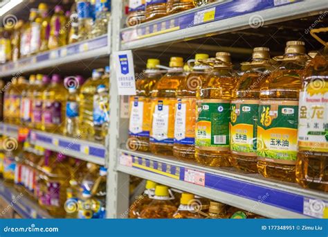 A Shelf Of Edible Oil In A Supermarket Editorial Photo Image Of