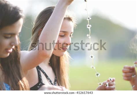 Teenage Girls Making Daisy Chains Park Stock Photo Shutterstock
