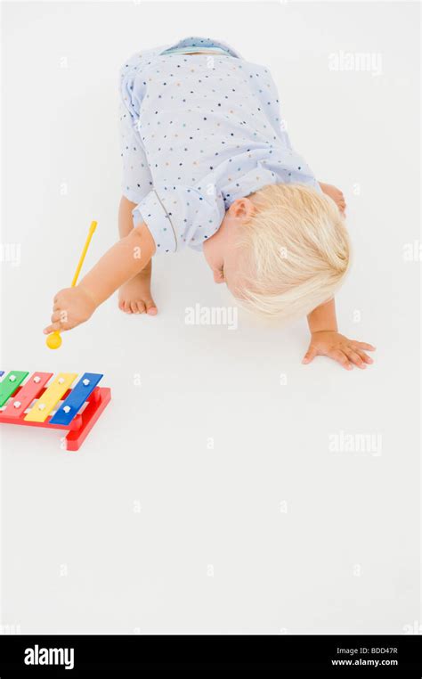 Baby Boy Playing With A Xylophone Stock Photo Alamy