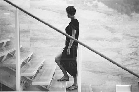 A Skinny Woman On Stairs Del Colaborador De Stocksy Anna Malgina