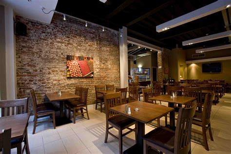 Mesmerizing Restaurant Interior Design Ideas With Brown Brick Wall And