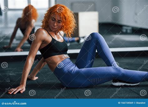 Sporty Redhead Girl Have Fitness Day In Gym At Daytime Muscular Body Type Stock Image Image